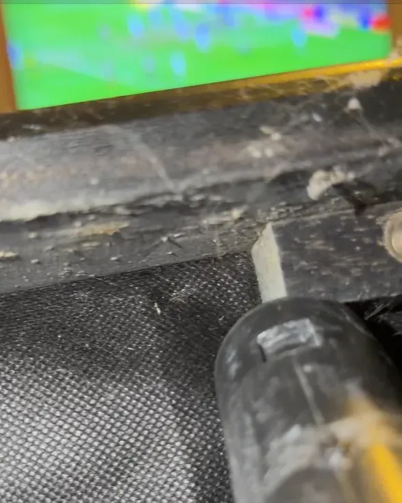 Sofa frame rail after vacuuming